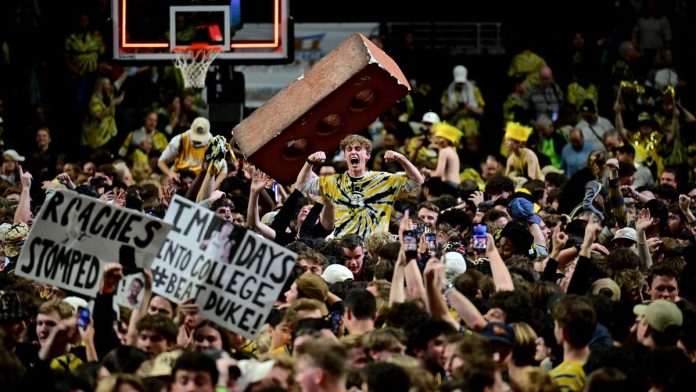Even after Kyle Filipowski injury, court storming is an addiction college hoops fans won’t quit