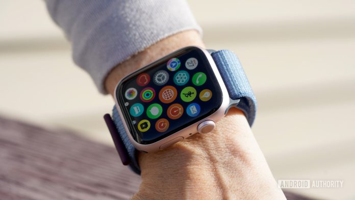 An Apple Watch Series 9 displays the app screen.